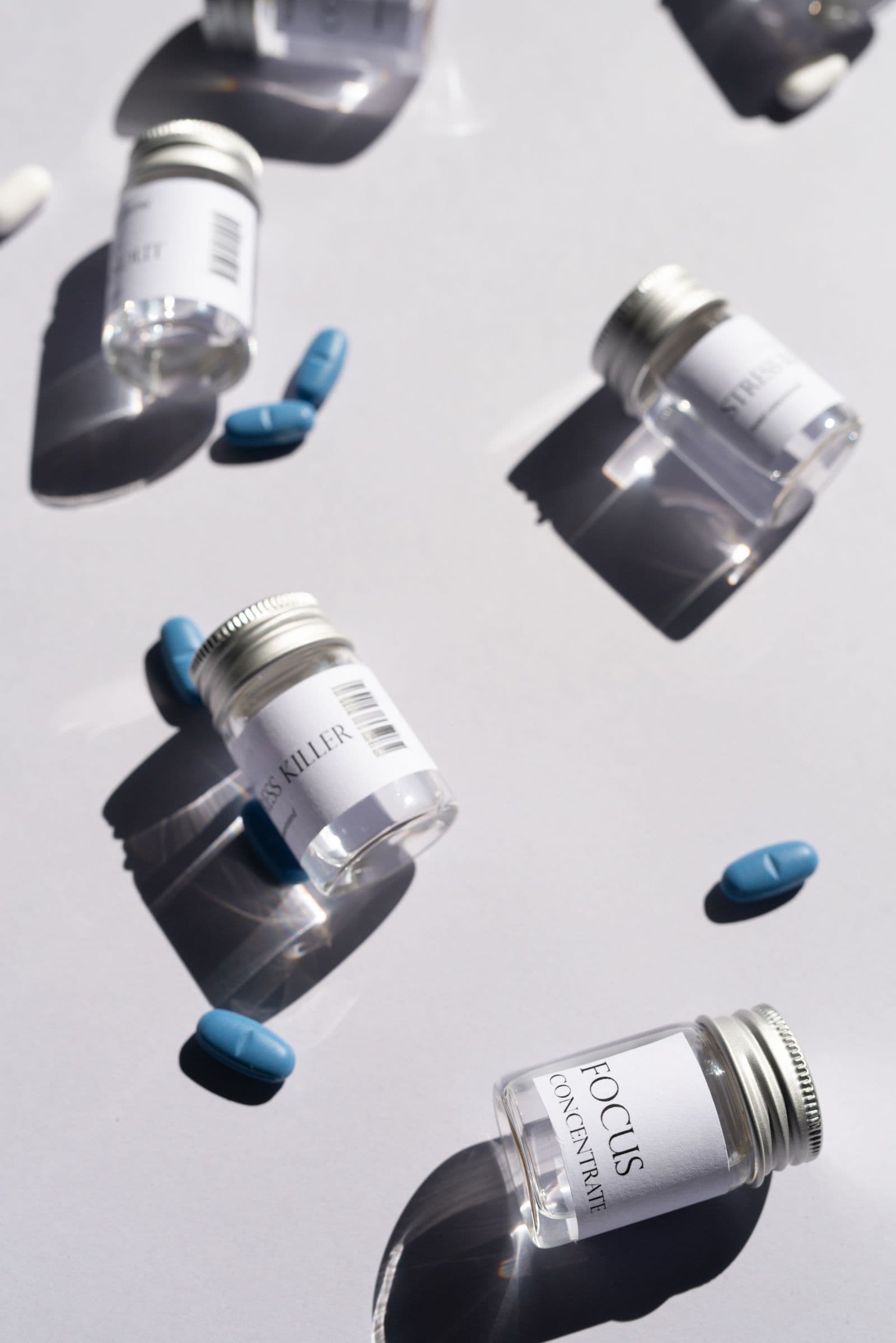 Supplement bottles with labels, ready to be photographed for upload